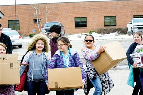 K. WIlliam Harvey students deliver 326 pounds of food to the Ronan Food Pantry Friday afternoon.