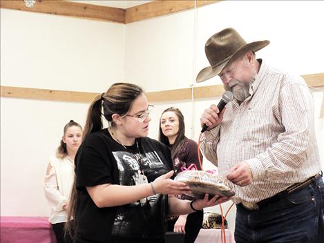 Desserts are auctioned off to the highest bidder.