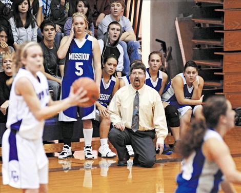 Les Rice watches his team during a game several years ago.