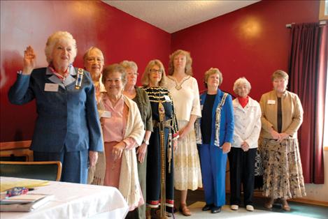 Kuilix Chapter  officers take the DAR pledge. From left,  Bonnie Huber, regent, Hope Stockstad, vice regent, Amanda Hodges, recording secretary, Shirley Cordis, chaplain, Carolyn Corey, corresponding secretary Nancy Mehaffie, treasurer Julia Borden, registrar,  Carolyn Swalling, historian, and Kathleen Normandeau, librarian.