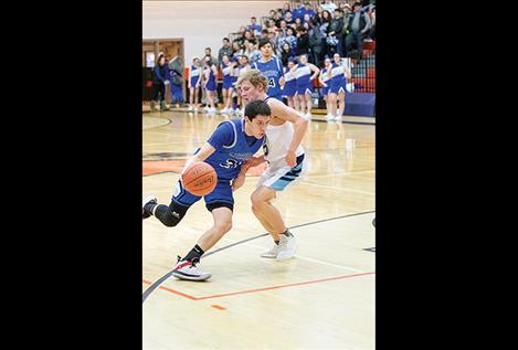 Mission Bulldog Wacey McClure slips past defender.