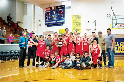 The Arlee  Warriors pose for a photo after taking second place at  divisionals.