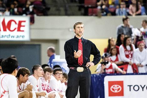 Arlee head coach Zanen Pitts  encourages his team. 