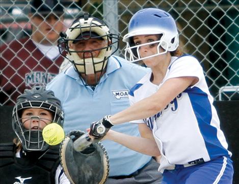 Senior Sara Nerby gets a base hit against Plains during divisionals last weekend.