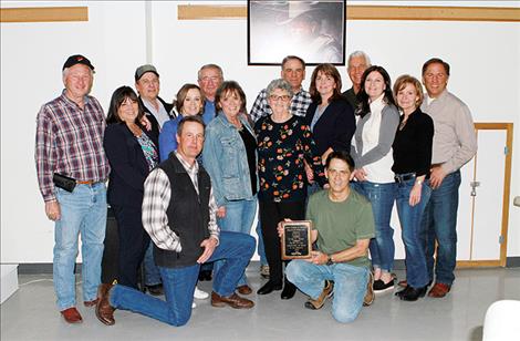 At the 41st Agriculture Appreciation Dinner held last month, the family of Everett Foust accepts a posthumous award for his lifelong dedication to agriculture, family and community.