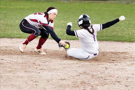 Lady Pirate Lisa Costilla beats the throw to second.