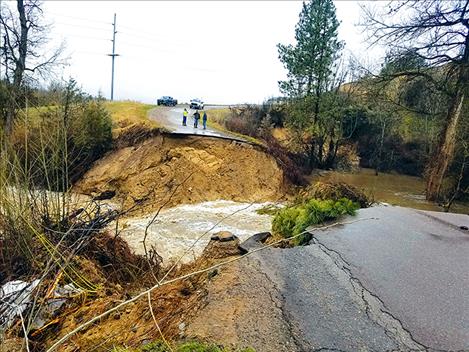 Mark Clary photo Dublin Gulch Road erodes from flood waters April 10. It could take months before it is repaired and re-opened.