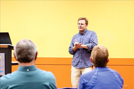 Tom Bansak, an aquatic ecologist and assistant director of the Flathead Lake Biological Station, fields questions from the Mission Mountain Audubon Society during an educational and informational program held Thursday evening at the Polson library meeting room.