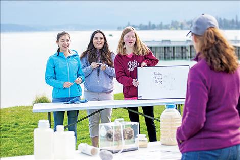 Joslin Howell, Abbey Howlett and Krystanna Larson put their aquatic invasive species knowledge to the test.