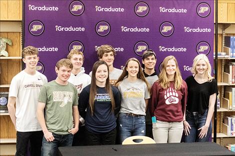 Nine Polson High School athletes from the Class of 2019 gathered Wednesday evening in the high school library to sign their national collegiate letter of intent continuing their athletic and academic careers. Pictured from left (front row): Quin Stewart, Ashlee Howell, Molly Sitter, Bea Frissell, Alexia Biederman; (back row) Robin Erickson, Mack Moderie, Matt Hobbs, Jonah DuCharme. (Andrey Bauer not pictured.)