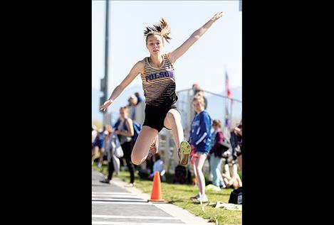 Polson Lady Pirate Mikaela Ducharme flies through the air in the triple jump.