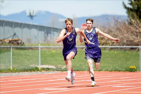 Charlo Vikings Isaiah Allik and Garett Vaughan make a  successful baton transfer.