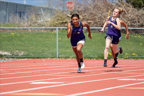 Charlo Lady Vikings Tyrah Hammond and Kaitlin Cox race in the 4X100 rela