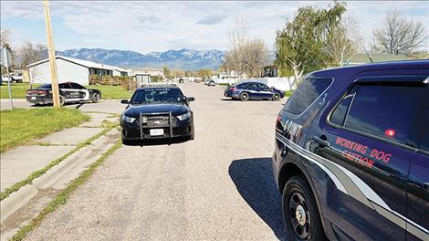 Law enforcement worked together in Polson to make arrests at 1002 5th St. in Polson. Dangerous drugs and devices for packaging and ingesting  them were found during the search. 