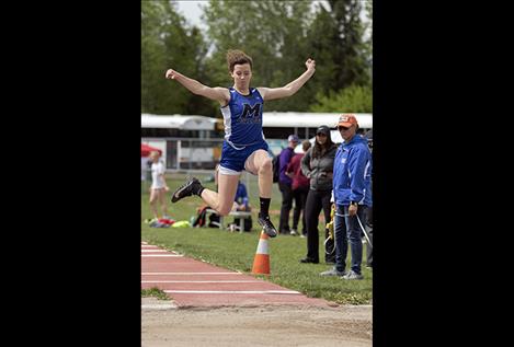 Mission Lady Bulldog Afton Brander competes in the long jump