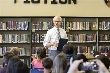 Montana Lt. Gov. Mike Cooney praised Polson High School and Middle School students for their conservation strategies and  efforts before presenting each school with a certificate, banner and  check for $1,000.  