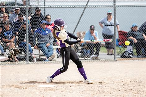 Polson Lady Pirate Lexi Orien makes contact for a base hit.