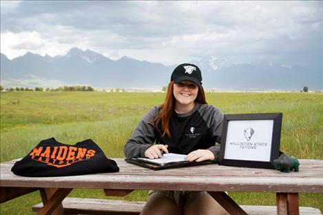  Emilie Corley signs her national letter of intent to play softball starting this fall at Williston State College in Williston, North Dakota