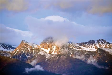 The amount of snowpack in the Mission Mountains helps predict the summer wildfire season.