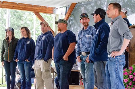St. Ignatius volunteer firefighters get a round of applause for their work from the crowd.