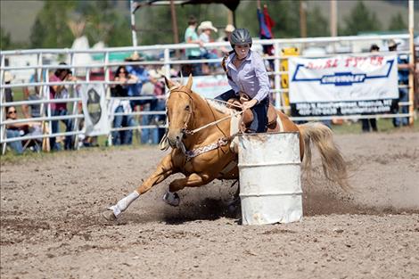 Charlo barrel racer Hailey Weible races to a 15.03 second place finish.