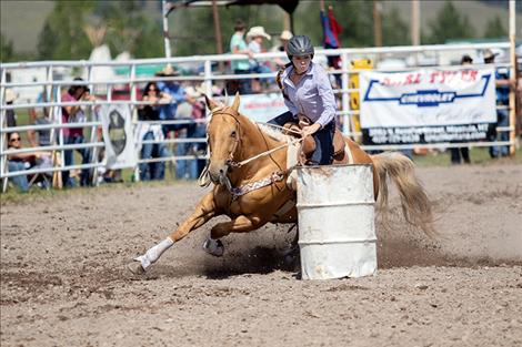 Charlo barrel racer Hailey Weible races to a 15.03 second place finish.