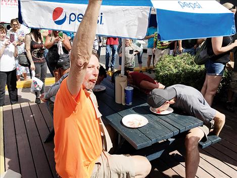 Adults competed in the pie eating contest as well as kids. 