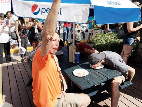 Adults competed in the pie eating contest as well as kids.