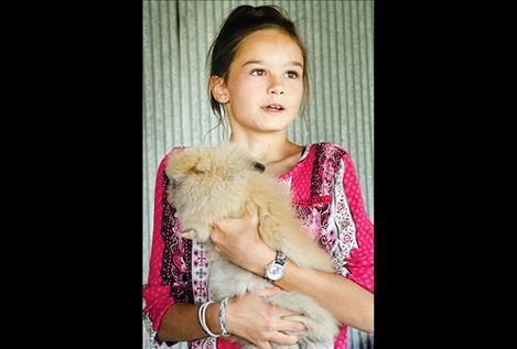 Rosslynn Wilson holds a bunny. 