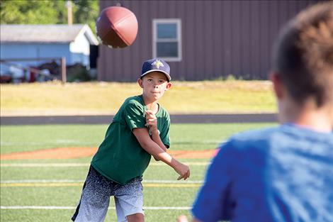 Case Cox practices his passing game.