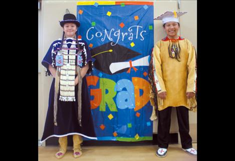 Perry and Sandoval pose for a photo moments before the graduation ceremony.