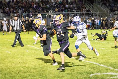 Pirate senior running back Dugan Davis runs 40-yards down the sidelines and into the endzone for a fourth quarter touchdown.