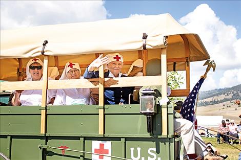During the Dayton Daze parade on Saturday, one float carried several women dressed as D-Day nurses.  