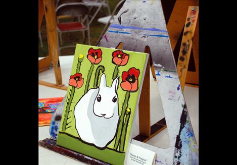 “Bunny and Poppies” is the title of this painting by 9-year old Ethan McCauley, who displayed two works at the show.