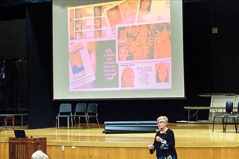 Approximately 100 people gathered for a free community seminar on human trafficking at the Polson High School auditorium.