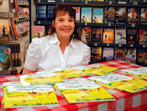 Author Joye Ann Albert signs copies of her book, “The Fair Sombrero,” at Polson Super 1 Foods on May 6.