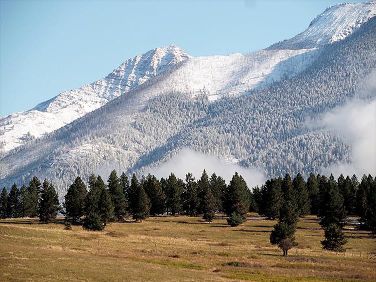 Snow-capped peaks: Mountains settle into winter mode in St. Ignatius.