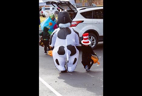 Creatures prowl the parking lot at the New Life Church in Polson on Saturday during the annual Pumpkin Patch Bash.