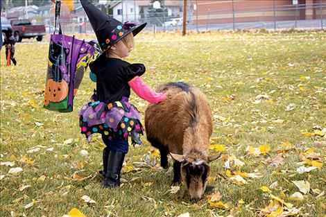Creatures prowl the parking lot at the New Life Church in Polson on Saturday during the annual Pumpkin Patch Bash.