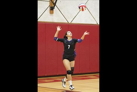 Lady Viking Bella Hawk fires a serve