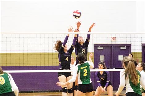 Polson's Lady Pirates battle it out on the court during a match earlier in the season.