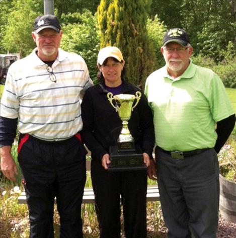 Winners of the 4th annual Farmers Insurance Senior Open golf tournament were, from left: Jim VanFossen, men’s senior champion; Cindy Templer women’s senior champion; and Jim Seals, super senior champion. 