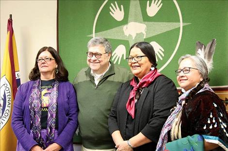 Three members of Council stand with Barr after a discussion on the MMIP issue. From left, Shelly Fyant, William Barr, Myrna Dumontier and Charmel Gillin.