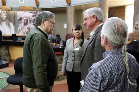 Barr speaks with Alan Mikkelsen after speaking with tribal Council. Council woman Anita Matt and Council Vice Chair Leonard Gray observe the talk.  Mikkelsen is the Senior Advisor to the  Secretary of the Interior on Western and Water Issues and Chair of the Secretary’s Indian Water Rights Working Group.