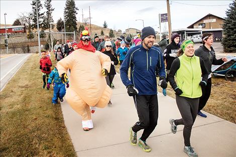 Runners who dressed for the occasion in festive outfits received a 30-second head start. 