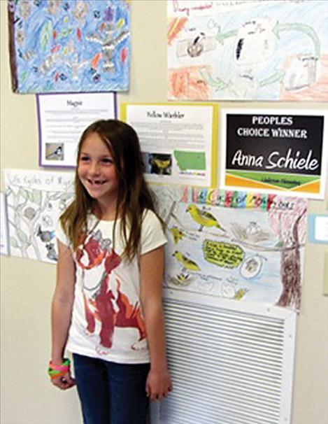 Anna Schiele won the People’s Choice award for her poster entry at the International Migratory Bird Day event May 23 at SKC.