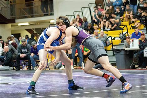 Polson Pirate wrestler Kellen Norman works for position against his opponent.