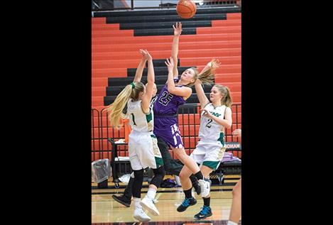Charlo Lady Viking Brooke Alder glides to the hoop.