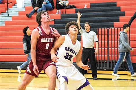 Charlo Viking Nathan Clark battles for a rebound.