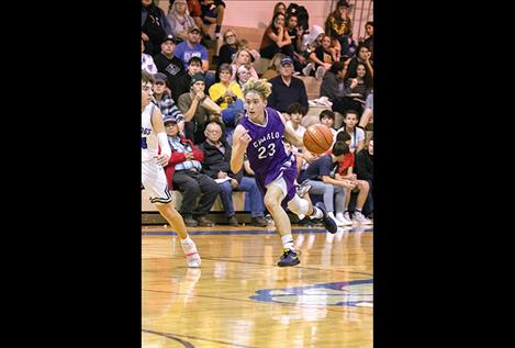  Charlo Viking Roper  Edwards races down court.